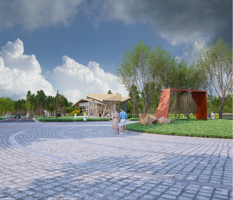 Paved circular area with modern art installations